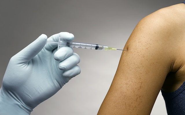 CDC Says Vaccinated Adults Don’t Need A Booster Shot ‘At This Time’