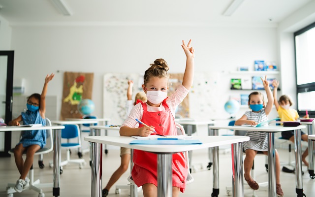 CDC Says Schools Should Still Implement Face Masks, Social Distancing Through End Of Term